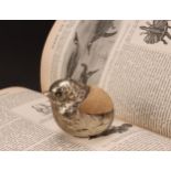 A large Edwardian novelty EPNS pincushion as a chick in a partial egg shell, 6cm high