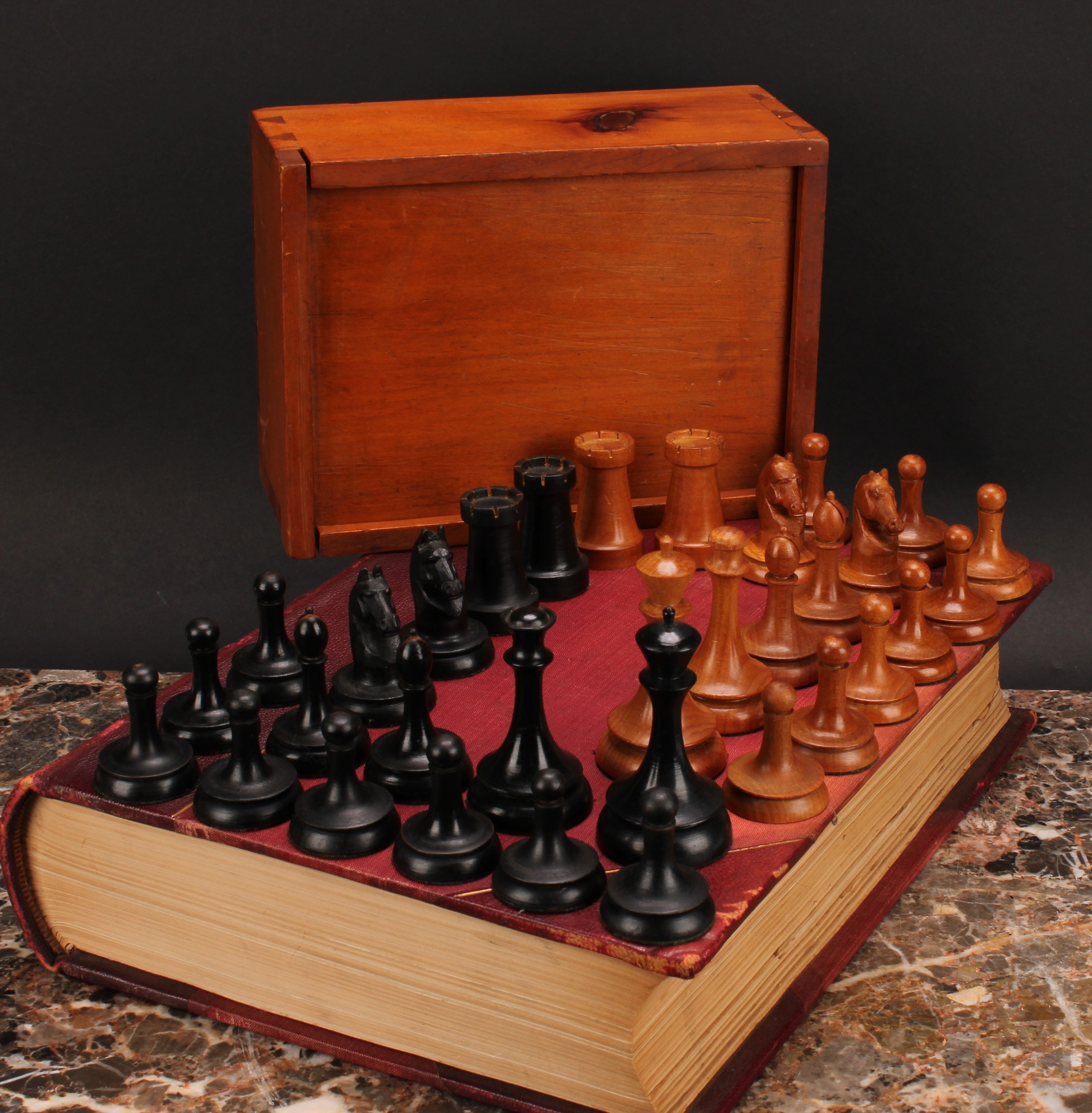 A mid-20th century beech and ebonised chess set, of Zagreb or Dubrovnik type pattern, the Kings