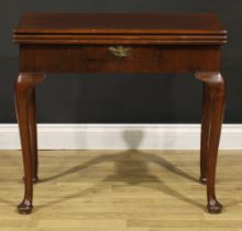 A George II mahogany double-top tea and card table, hinged top enclosing an open plateau and a baize
