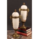 A pair of French gilt metal mounted marble mantel urns, 33cm high, first-half 20th century