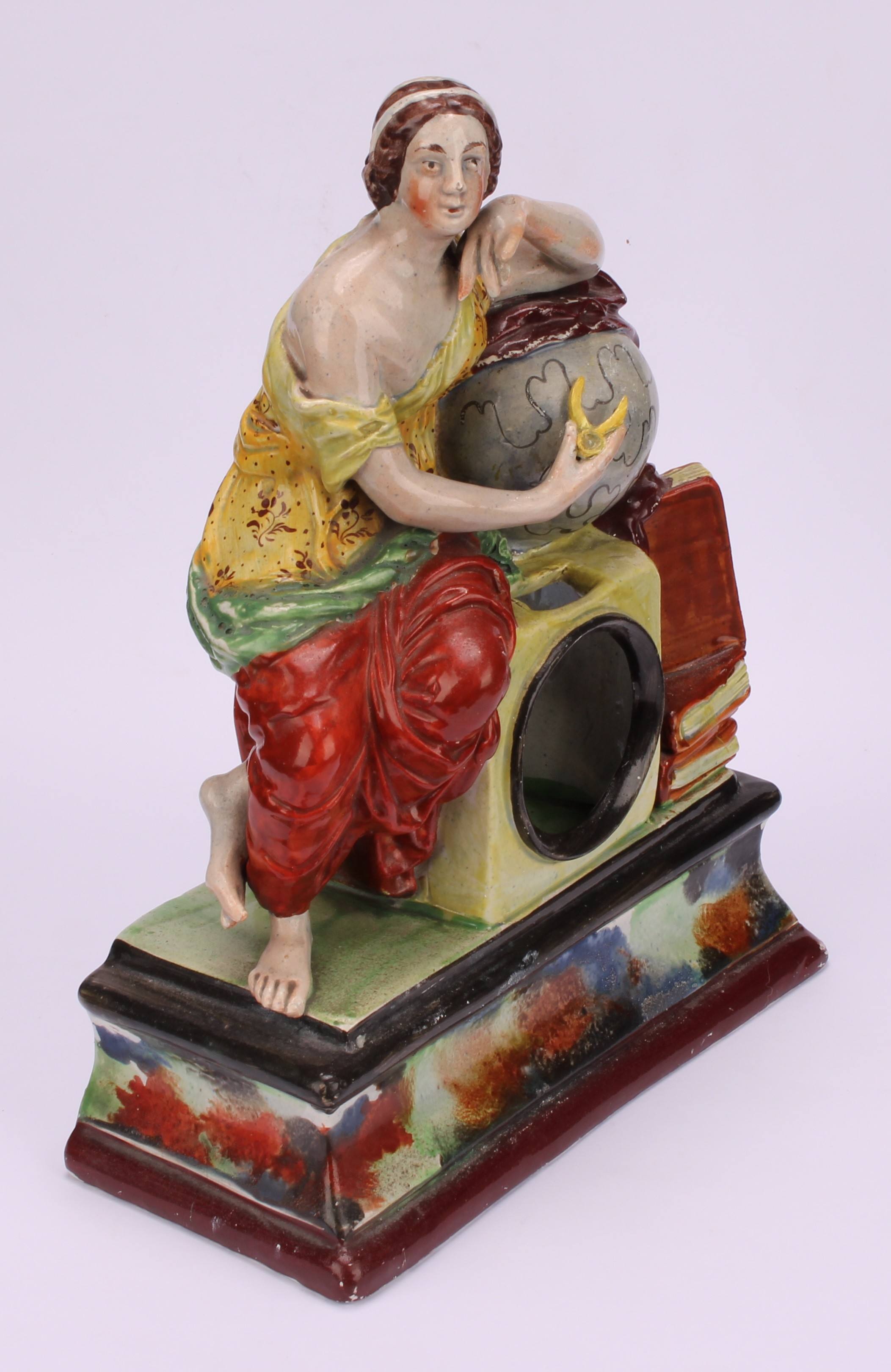 A Staffordshire pearlware pocket watch stand, modelled as Urania, The Muse of Astronomy, seated upon - Image 3 of 5