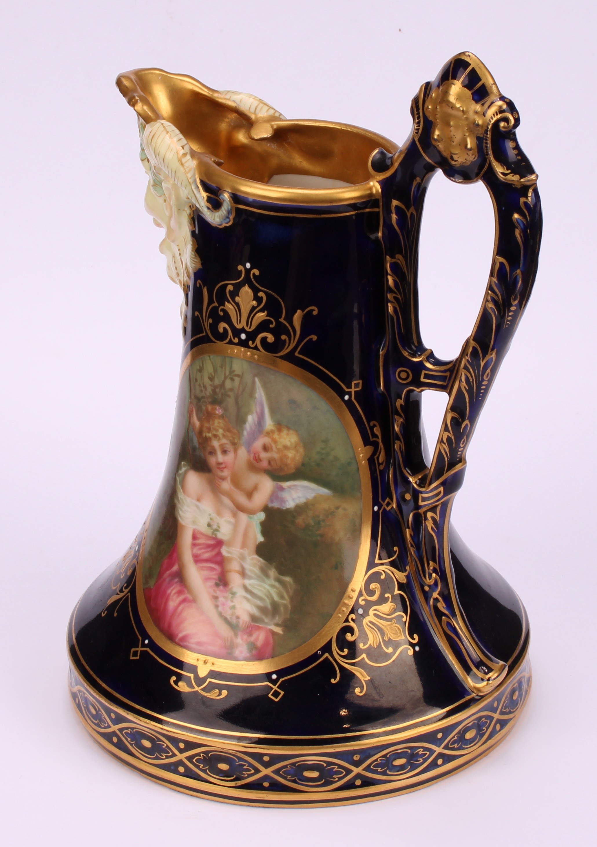 A Vienna porcelain jug, the central oval cartouche painted with Cupid and Psyche, Bacchic mask spot, - Image 4 of 5