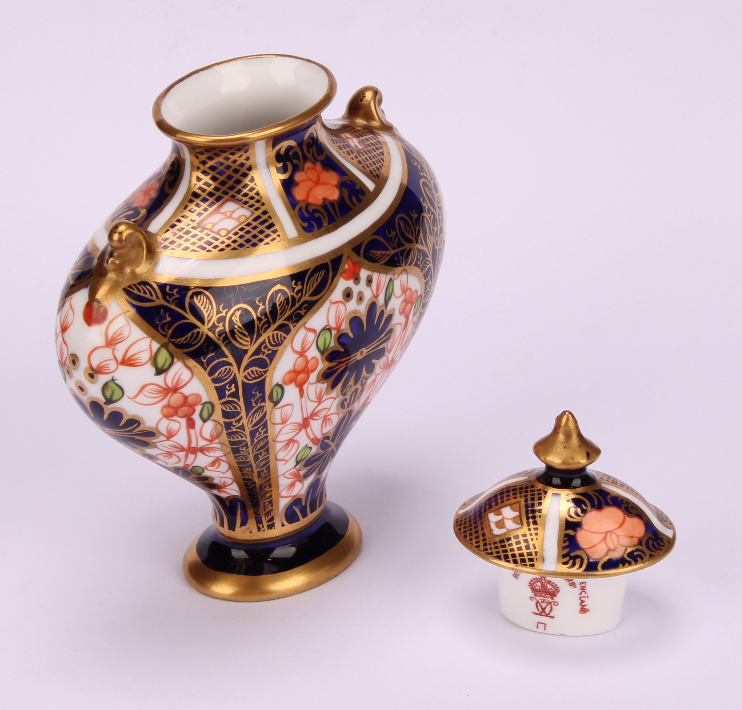 An associated pair of Royal Crown Derby 1128 Imari pattern flattened ovoid pedestal vases, oval - Image 5 of 12