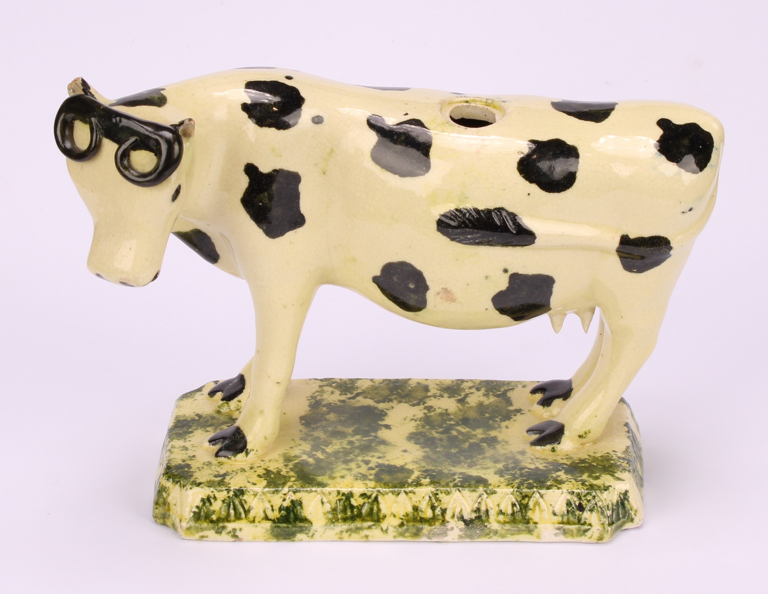 An early 19th Staffordshire spongeware cow creamer, as a dairy cow, 12cm; a 19th century - Image 3 of 11