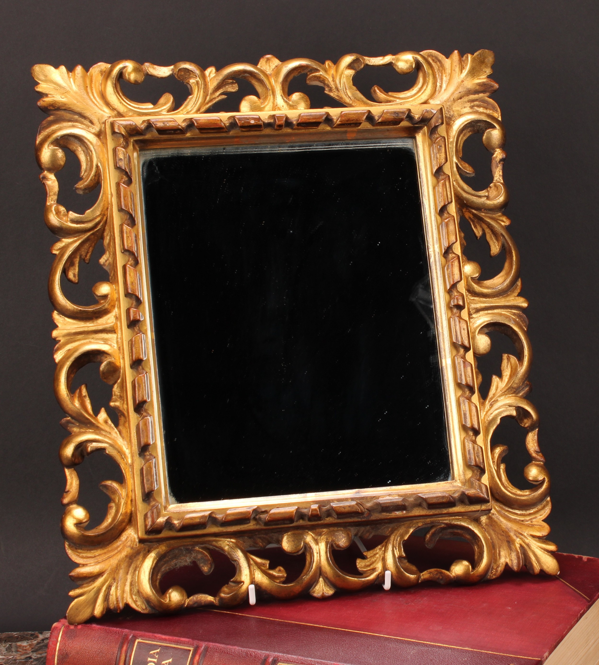 A 19th century giltwood looking looking glass, rectangular mirror plate, pierced and carved acanthus