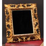 A 19th century giltwood looking looking glass, rectangular mirror plate, pierced and carved acanthus