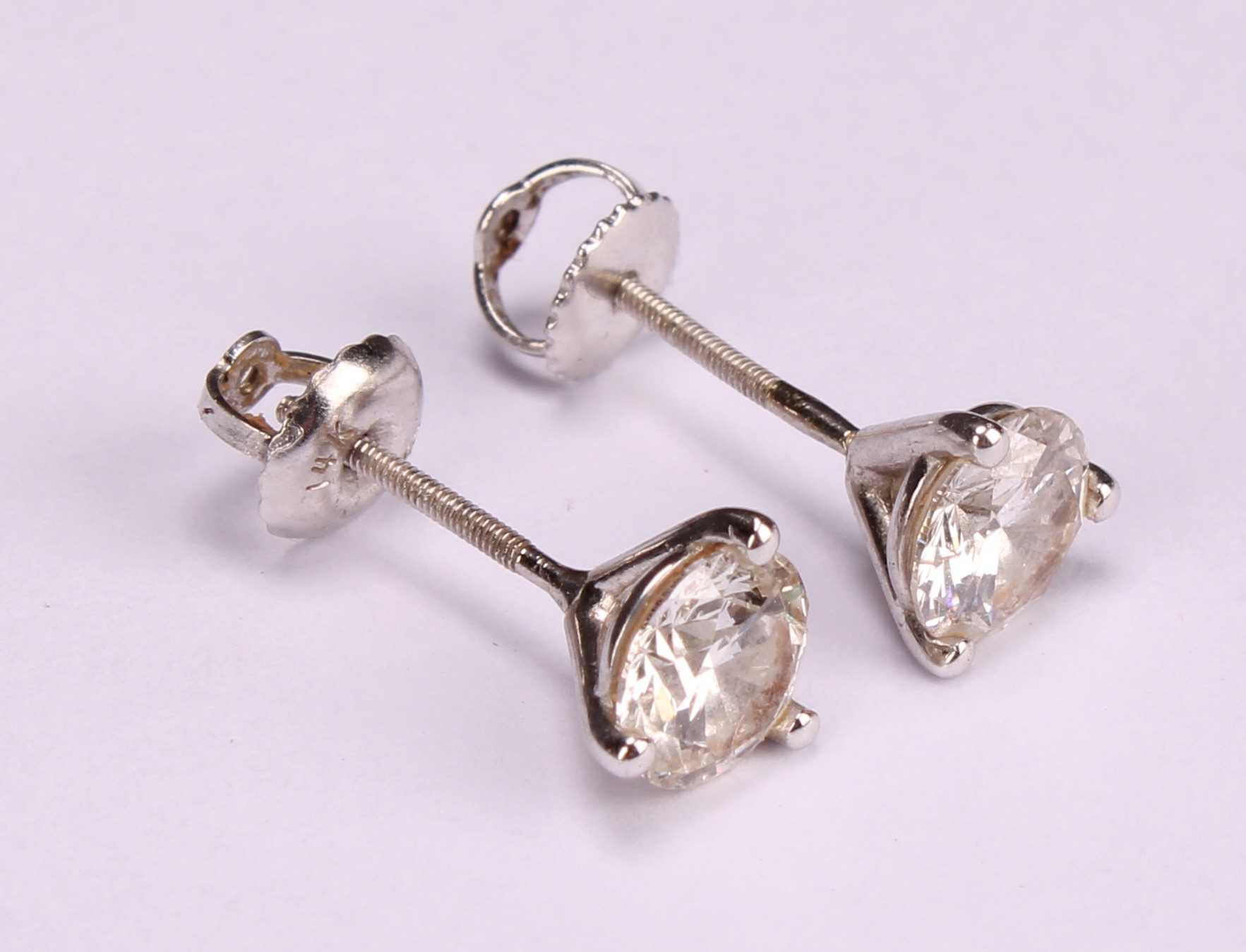 A pair of 14ct white gold diamond stud earring, each diamond approx. 5.8mm, approx. total weight 1. - Image 4 of 4