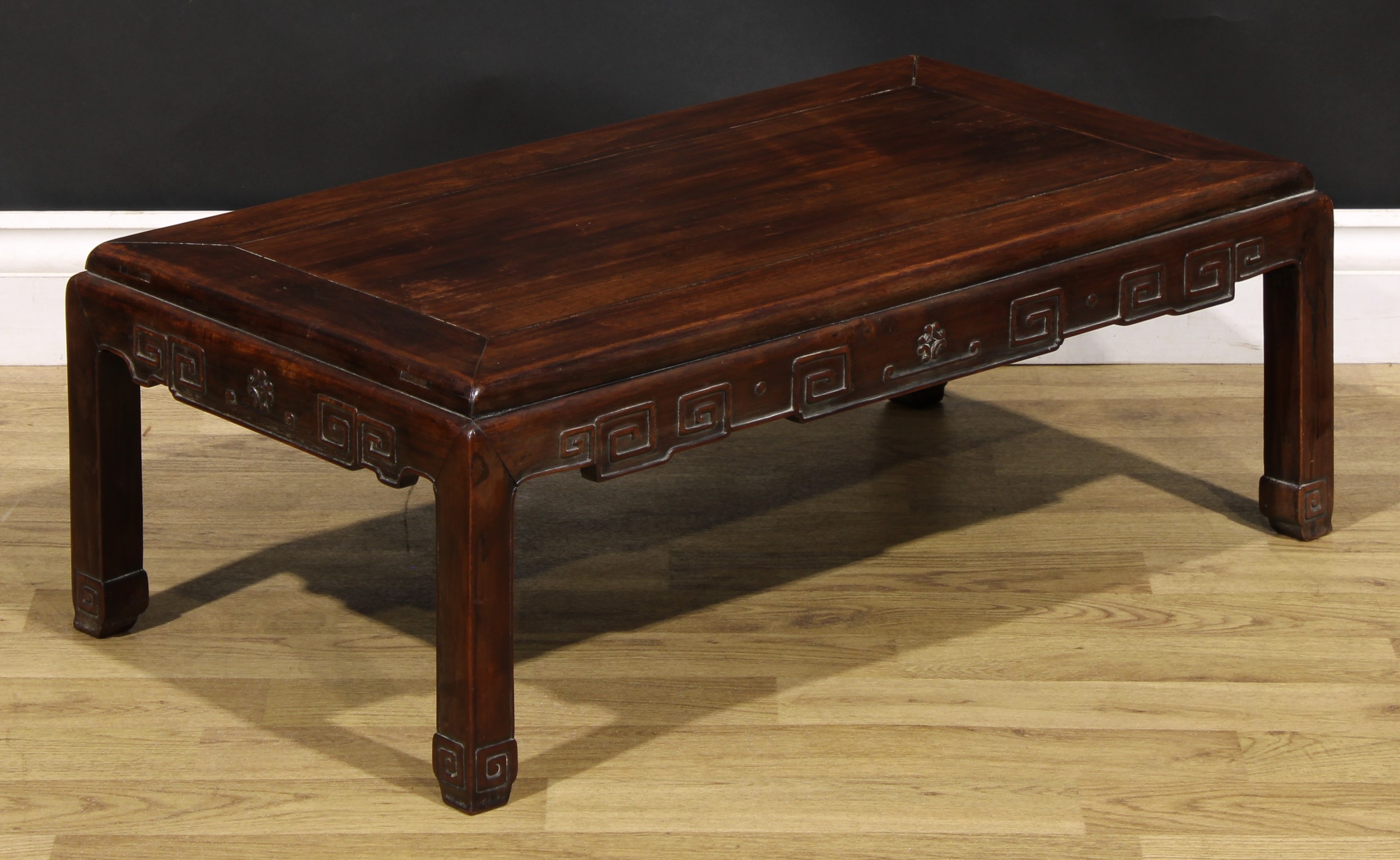 A Chinese hardwood low tea table, panel top, shaped apron carved with angular stylised clouds, - Image 3 of 5