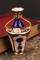 A Royal Crown Derby 1128 Imari pattern ogee shaped two-handled vase, of slender form, foliate