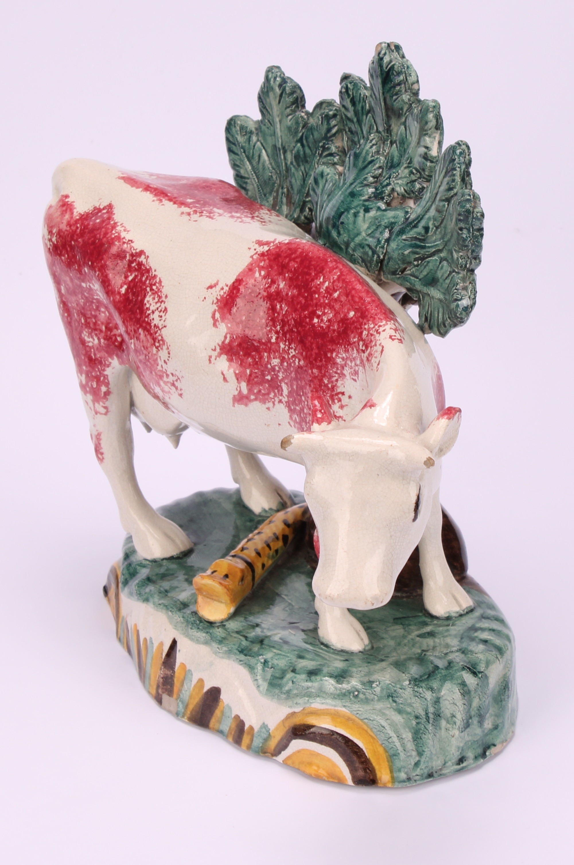 An early 19th Staffordshire spongeware cow creamer, as a dairy cow, 12cm; a 19th century - Image 10 of 11