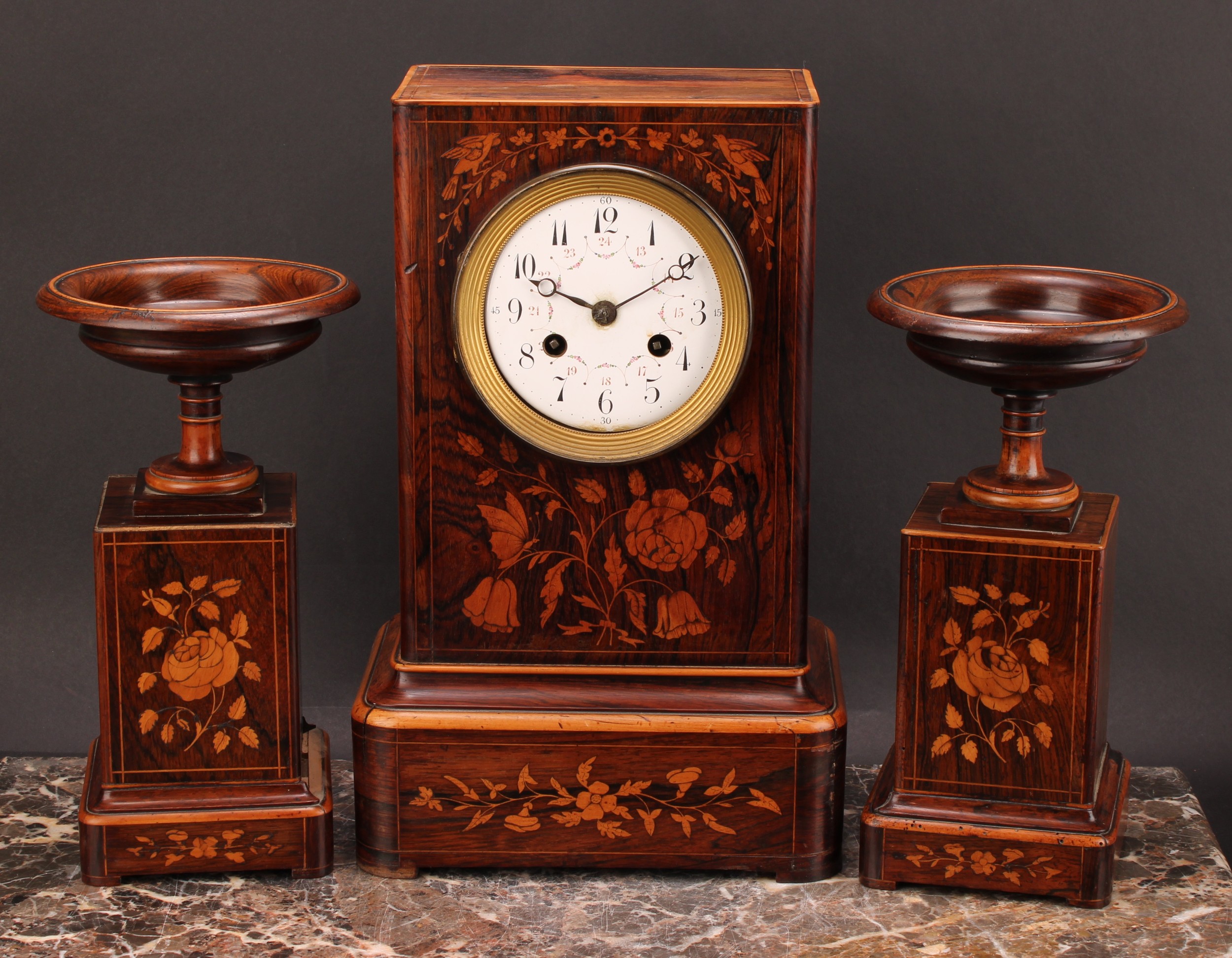 A 19th century French rosewood and marquetry mantel clock garniture, 10cm enamel dial inscribed with