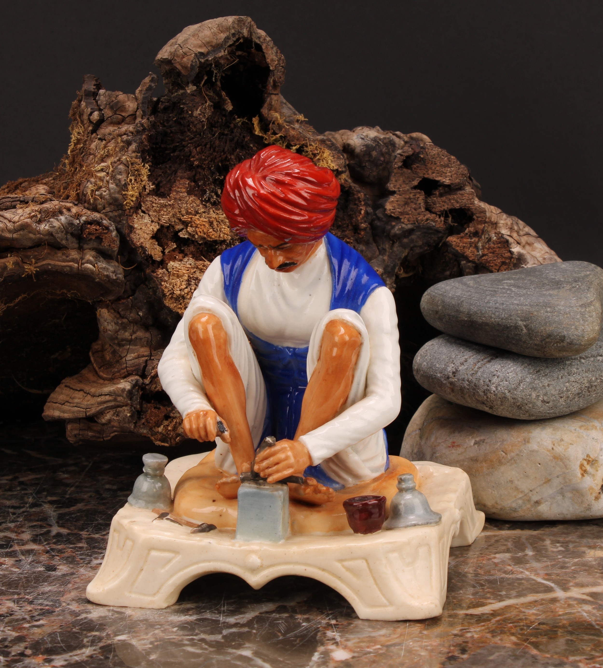 A Royal Worcester figure, Karen Singh - Toolmaker, modelled by James Hadley, 11.5cm high, crown