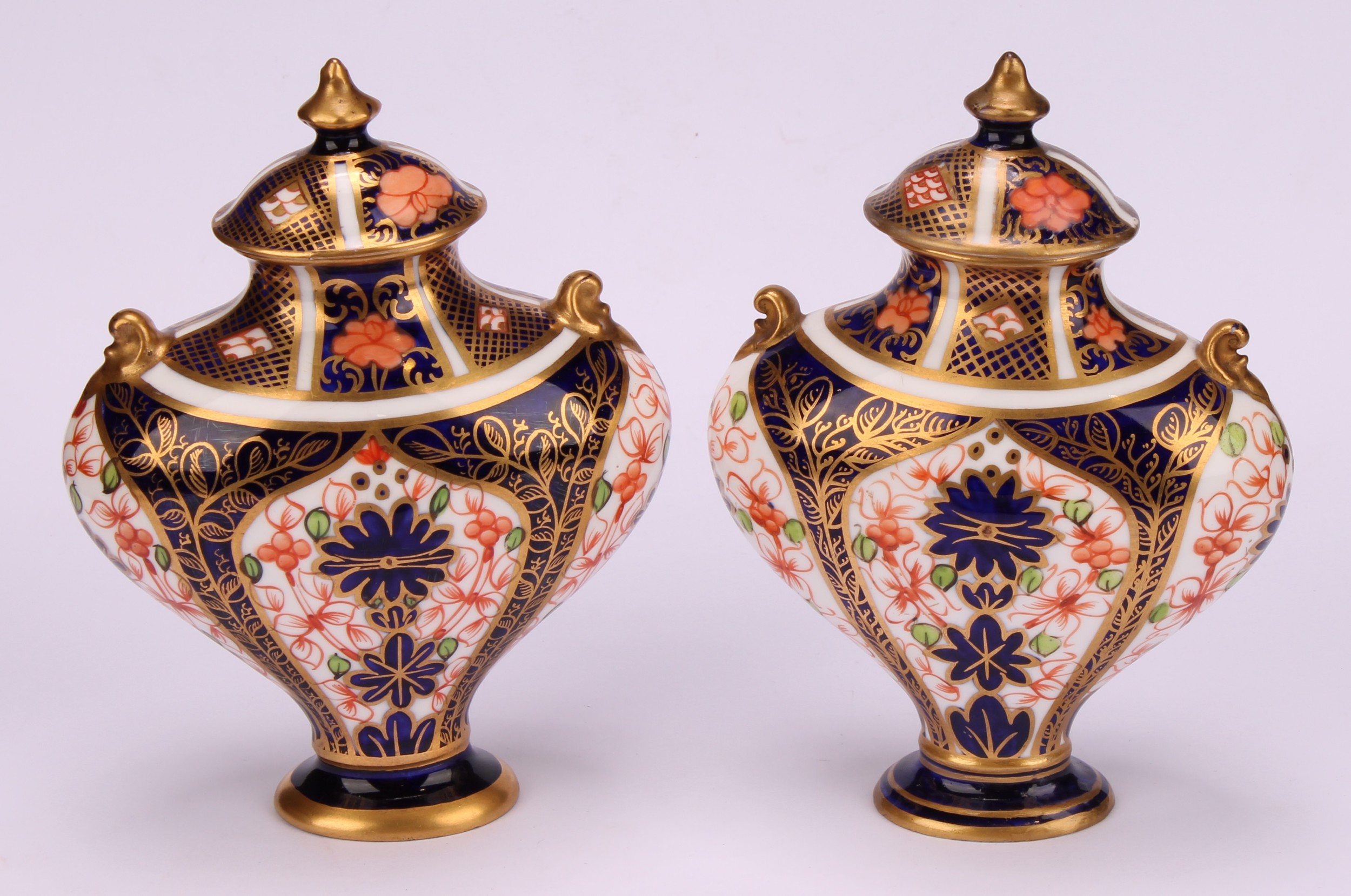 An associated pair of Royal Crown Derby 1128 Imari pattern flattened ovoid pedestal vases, oval - Image 2 of 12