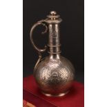 A Victorian silver globular wine ewer, chased with Green Man mask and mask of a classical lady,