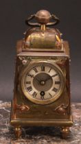 An early 20th century brass pylon shaped mantel timepiece, 5.5cm silvered dial inscribed with
