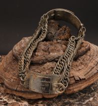 A 19th century American chain-link dog collar, the rectangular plaque inscribed Dr J Hyndman, 46