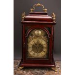 An 18th century style gilt metal mounted mahogany repeating musical bracket clock, 16cm arched brass