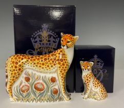 A pair of Royal Crown Derby paperweights, Cheetah and Cheetah Cub, gold stoppers, the Cheetah 14cm