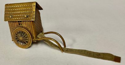 Haberdashery - a Victorian novelty tape measure, as a bathing machine, 5cm high
