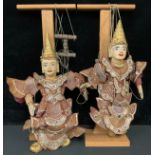 A pair of Indonesian wayang golek puppets, as traditional figures (2)