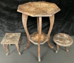A late 19th century Liberty carved table with under tier; two smaller (3)