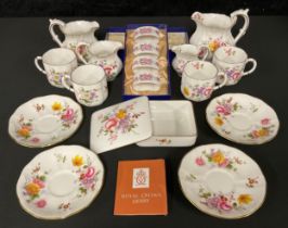 A Royal Crown Derby ‘Derby Posies’ pattern tea service for four, comprising teacups, saucers,