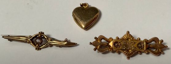 A Victorian 9ct gold bar brooch, 4.75cm wide, Birmingham 1892, steel pin, 2.6g; another similar, 1.