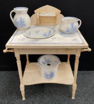 An early 20th century Continental painted pine wash stand and toilet set, including jug, bowl,