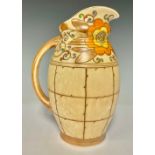 Ceramics - a Bursley Ware Charlotte Rhead Arabesque pattern jug, 24cm high