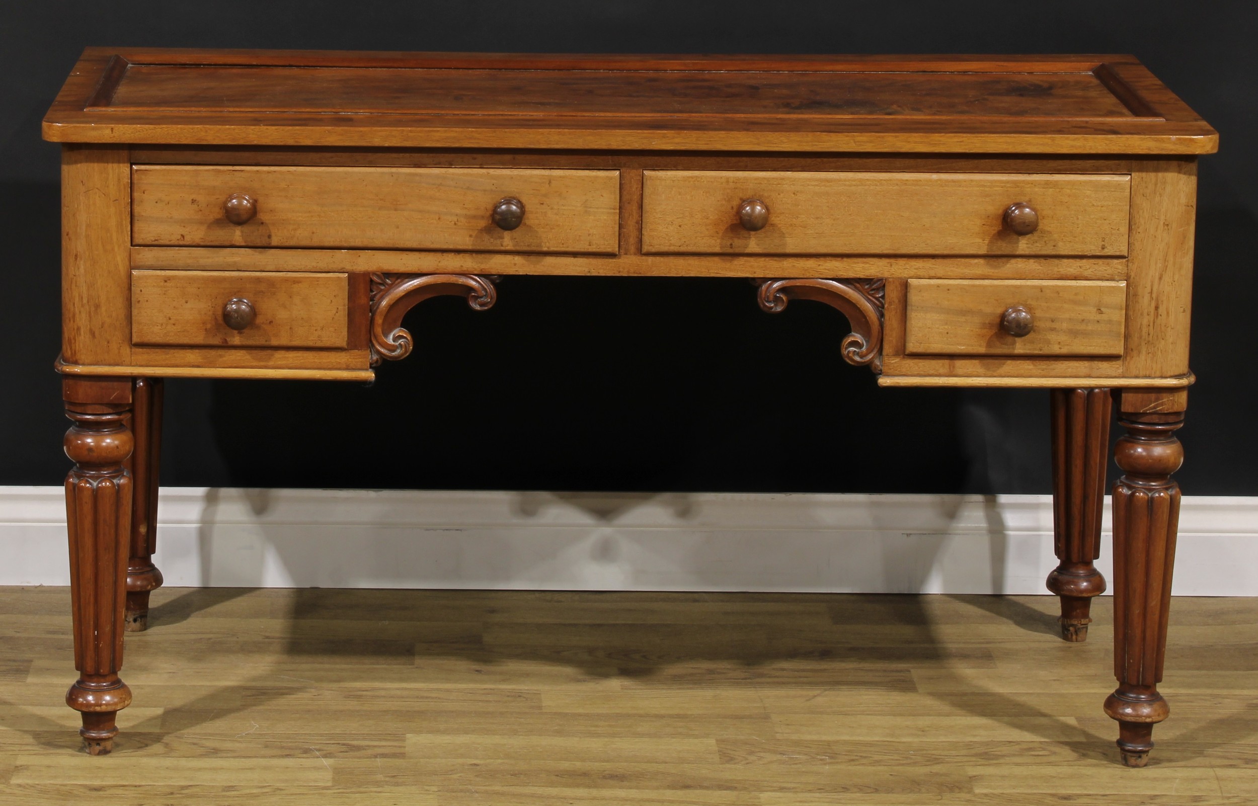 A late Victorian mahogany bedroom side table, 67.5cm high, 120cm wide, 53cm deep