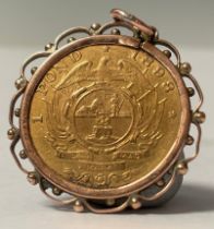 A South African gold 1 Pond coin, 1898, mounted in 9ct rose gold as a pendant/fob, 9.3g gross