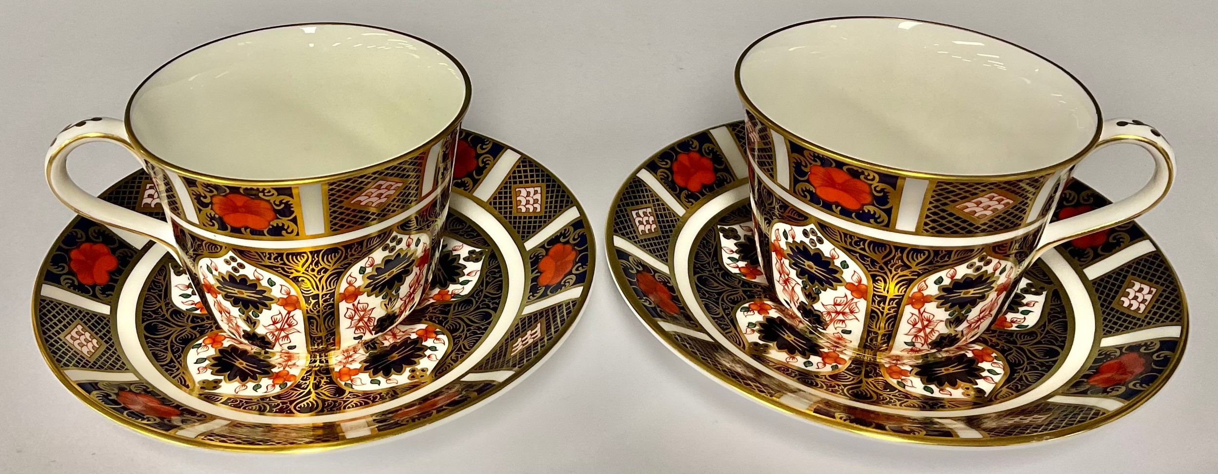 A pair of Royal Crown Derby Imari 1128 pattern teacups and saucers, first quality (4)