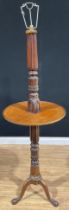 A mahogany tripod floor lamp, 161cm high under fitting