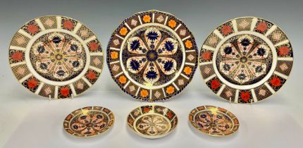 A pair Royal Crown Derby Imari 1128 pattern side plates, first quality; an 1128 coaster, first