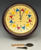 A reproduction RAF fusee wall clock, 32cm diameter dial, 38cm diameter overall, with key and