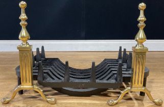 An Adam design brass and cast iron fire basket, the andirons 36cm high, 52cm wide including andirons