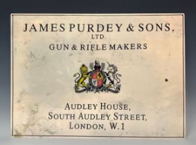 A reproduction tin Advertising sign, James Purdey & Sons Ltd, Gun & Rifle Makers, Audley House,