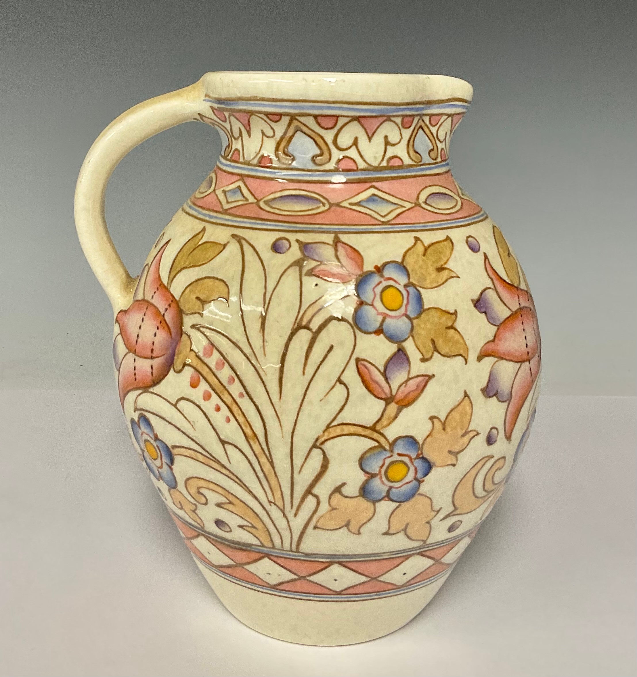 Ceramics - a large Bursley Ware Charlotte Rhead TL76 Wind Tossed Tulip pattern jug, 21cm high