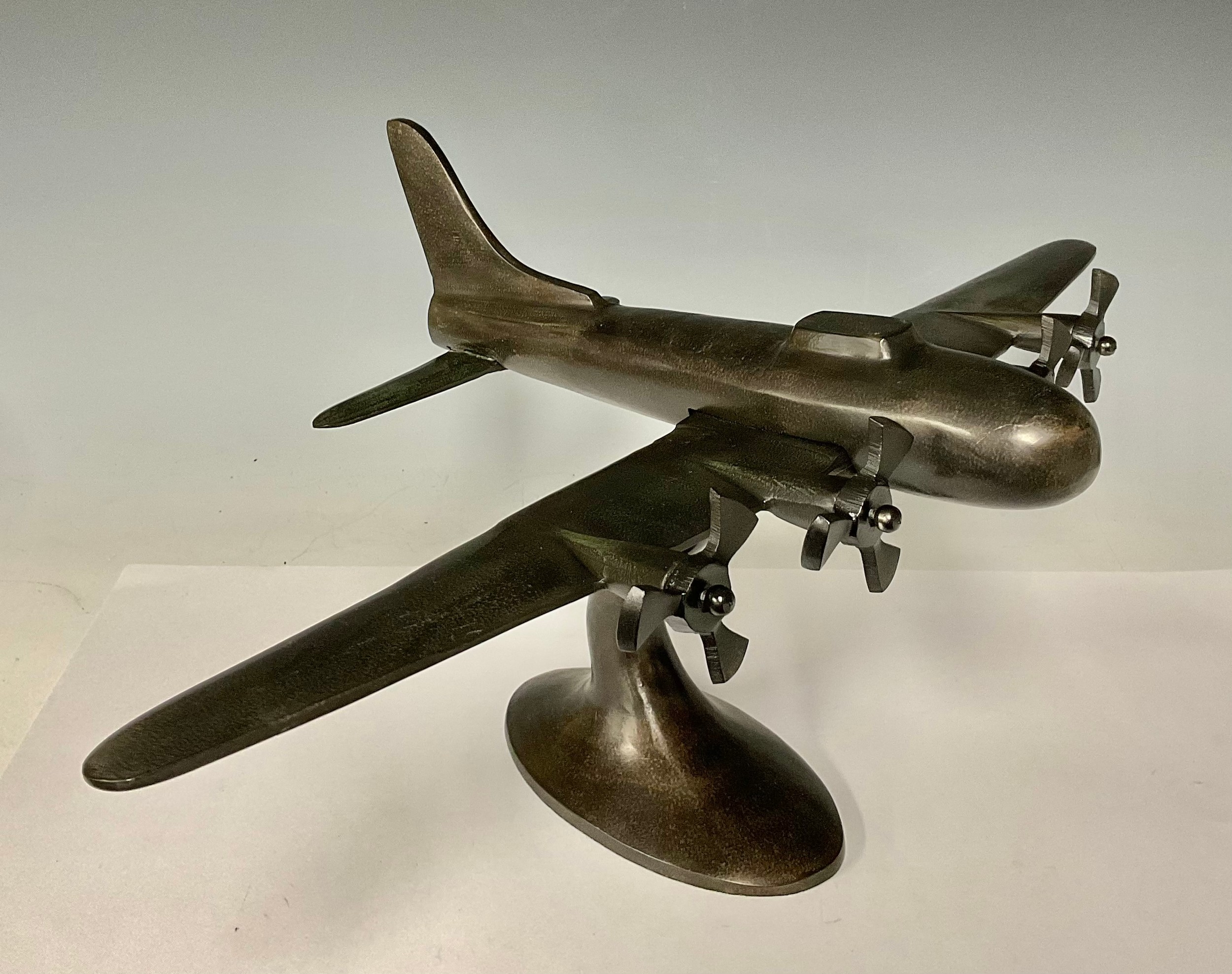 A bronzed model aeroplane on stand, 27cm high, 33cm long - Image 2 of 2