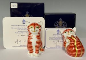 An associated pair of Royal Crown Derby paperweights, Ginger Kitten, special "Business to