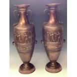 A pair of large neo-classical bronzed metal twin handled urns, after Fedinand Barbedienne, each