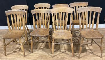 A harlequin suite of eight farmhouse beech lath back side chairs, six with elm seats (8)