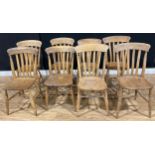 A harlequin suite of eight farmhouse beech lath back side chairs, six with elm seats (8)