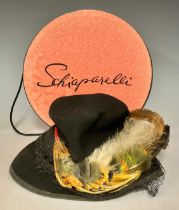 Fashion - a Schiaparelli fashion hat box; an elaborate feathered hat