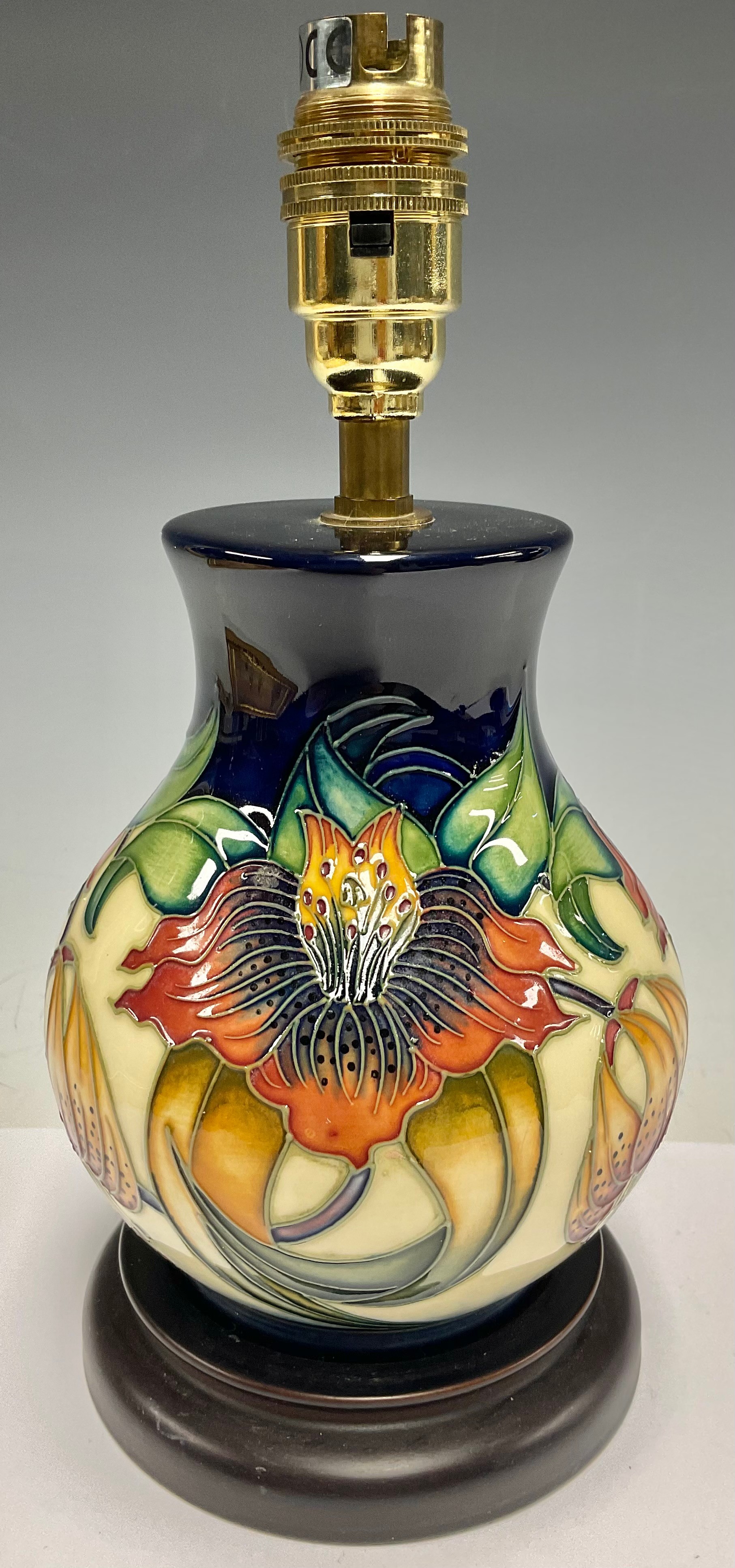 A Moorcroft Anna Lily pattern baluster table lamp, designed by Nicola Slaney, integral circular