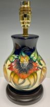 A Moorcroft Anna Lily pattern baluster table lamp, designed by Nicola Slaney, integral circular