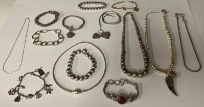 A Suarti sterling silver fob chain, love heart fobs, with a T-bar, marked 925; a Suarti sterling