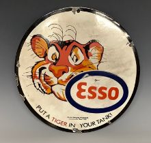 A replica enamelled circular advertising sign, Esso, Put A Tiger In Your Tank, approx. 30.5cm