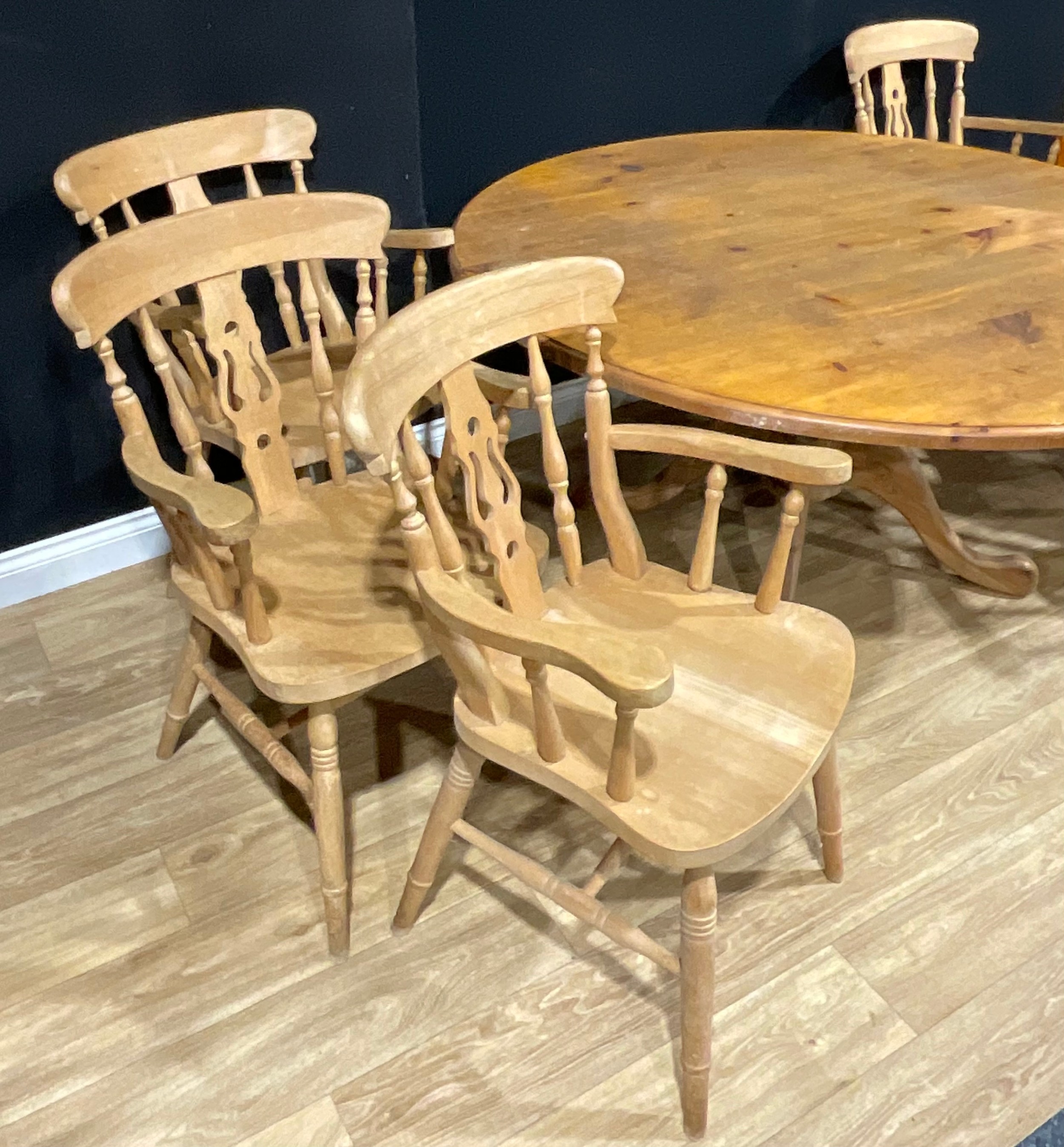 A farmhouse pine circular dining table, 72cm high, 151.5cm diameter; a set of seven beech carver - Image 3 of 3