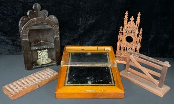 A late 19th century mahogany folding writing slope, outlined with ebony stringing, brass